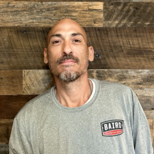 San Antonio structural installer smiles for headshot