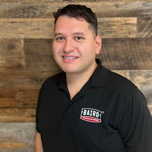 Corpus Christi system design specialist smiles for small headshot
