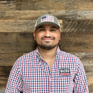 Warehouse Foreman smiles for headshot