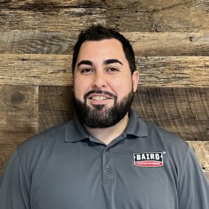 San Antonio system design specialist smiles for headshot