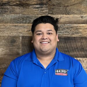 Austin system design specialist smiles for headshot