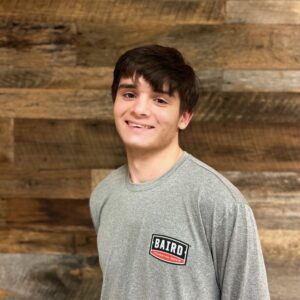 San Antonio structual installer smiles for headshot