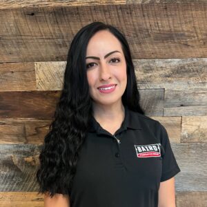 Customer Care Specialist smiles for her headshot