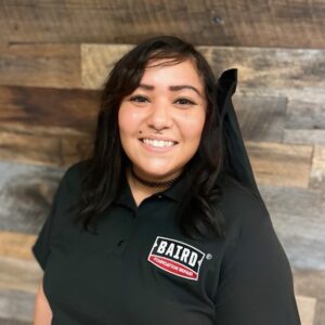 Customer care specialist smiles for headshot