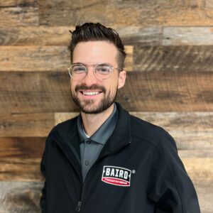 San Antonio Commercial System Design Specialist smiles for his headshot at Baird's Office