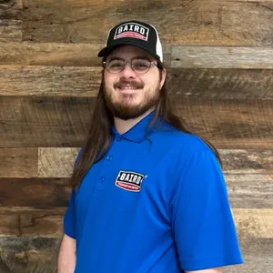Houston System Design Specialist smiles for his headshot