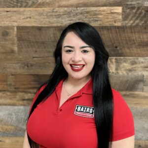 Project Coordinator smiles for headshot