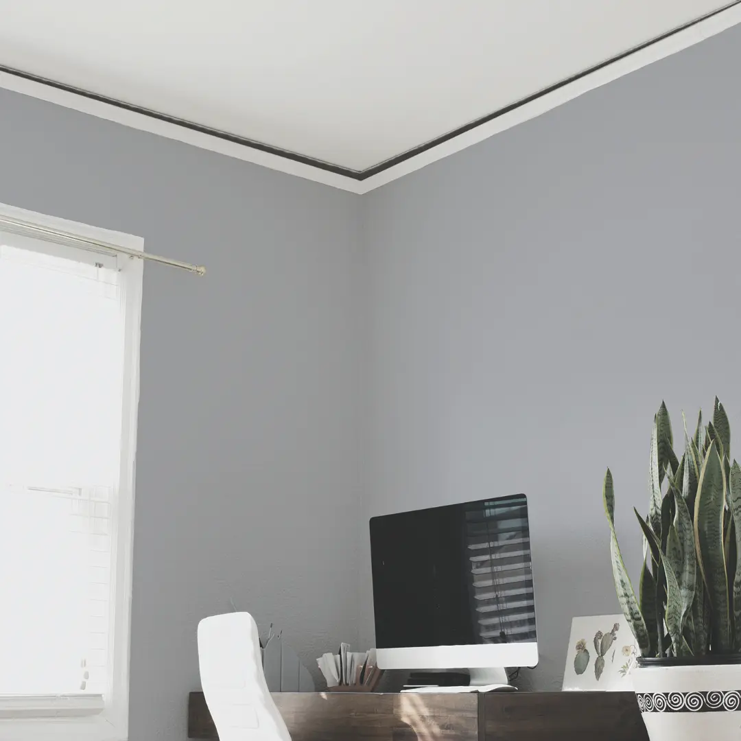 Gaps between wall and ceiling indicating foundation issues.