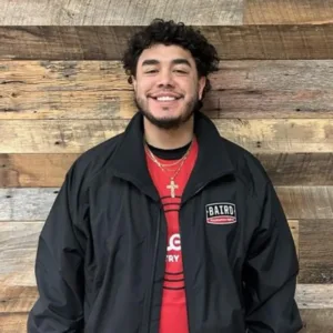 Installer for San Antonio smiles for his headshot.