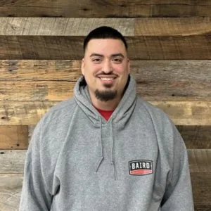 Installer for San Antonio smiles for his headshot.