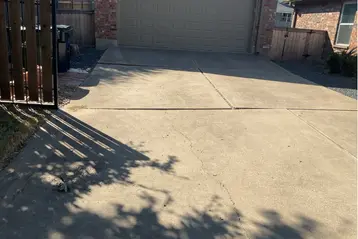 Hutto home with settled driveway.