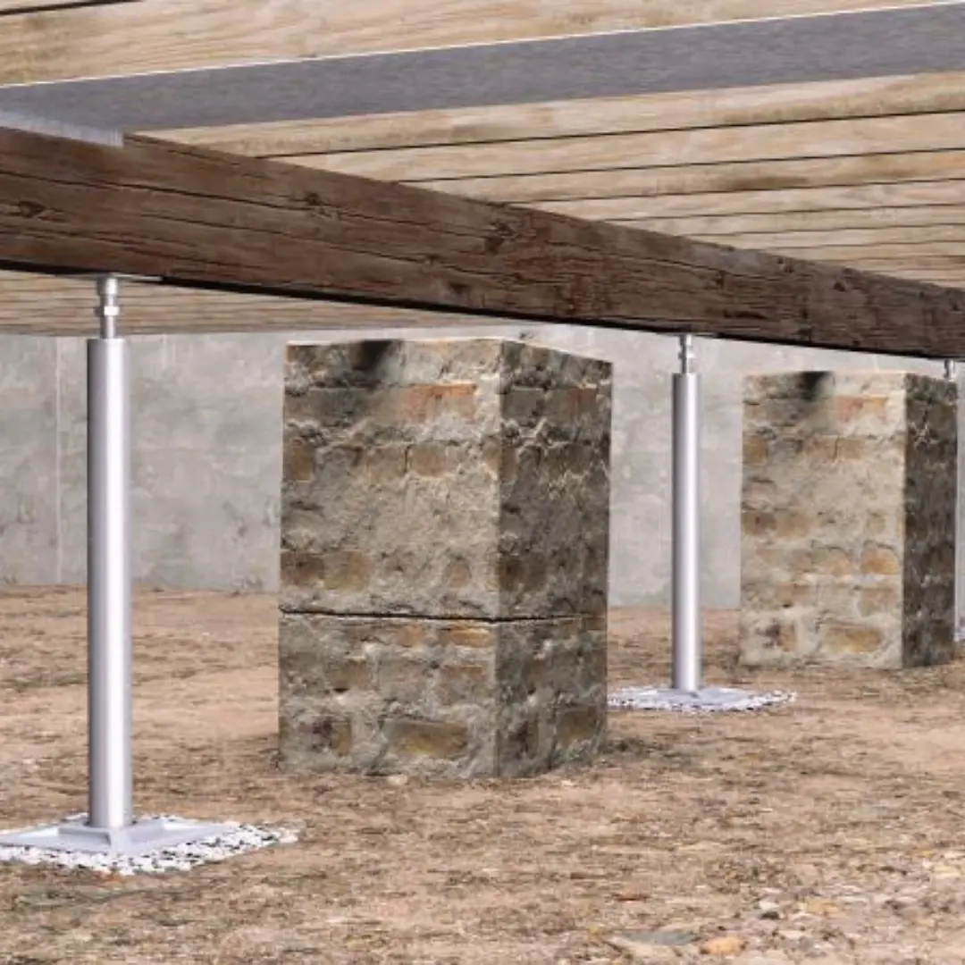 Steel SmartJack® support posts installed beneath crawl space beams to stabilize sagging floors in a San Antonio pier and beam home.