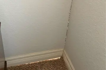 Customers home in San Antonio showing signs of foundation issues with cracks in walls and opening in the floor