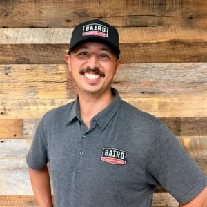 Houston System Design Specialist Daniel Martinez smiles for his headshot.