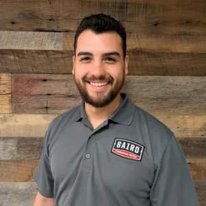 Houston System Design Specialist smiles for his headshot.
