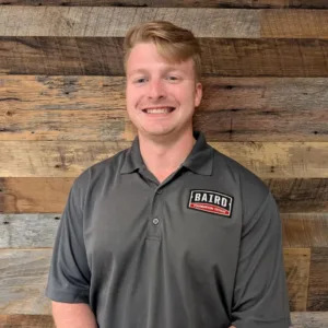 Austin Clark Houston System Design Specialist smiles for his headshot.
