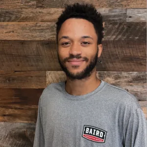 Jonathan Ragan San Antonio Installer smiles for his headshot at the San Antonio office.