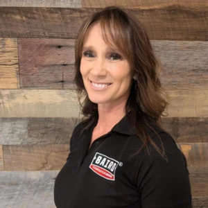 Stef Austin System Design Specialist smiles for her headshot