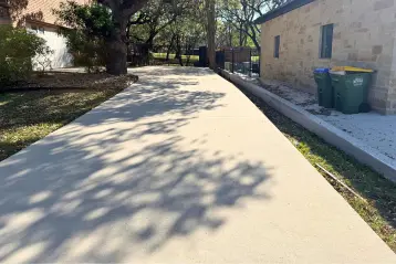 Happy Customers driveway after we installed polylevel, nexuspro and sealantpro in Oaks Ranch, TX
