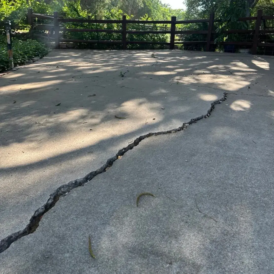 Cracks in a customers backyard before we installed PolyLevel and Nexuspro