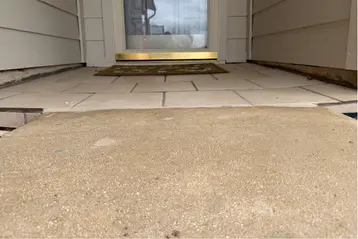 Walkway lifted and leveled with Baird Foundation Repair Polylevel