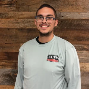 Jaden Blythe ATX Concrete Co Foreman smiles for his headshot