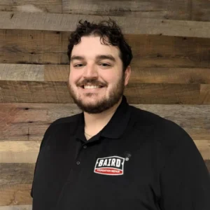 Landon Leger Houston System Design Specialist smiles for his headshot