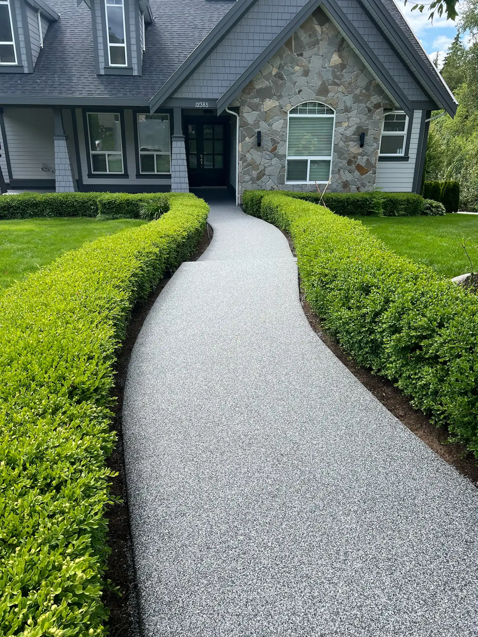 Vuba Stone sidewalk leading up to house Resurfacing After