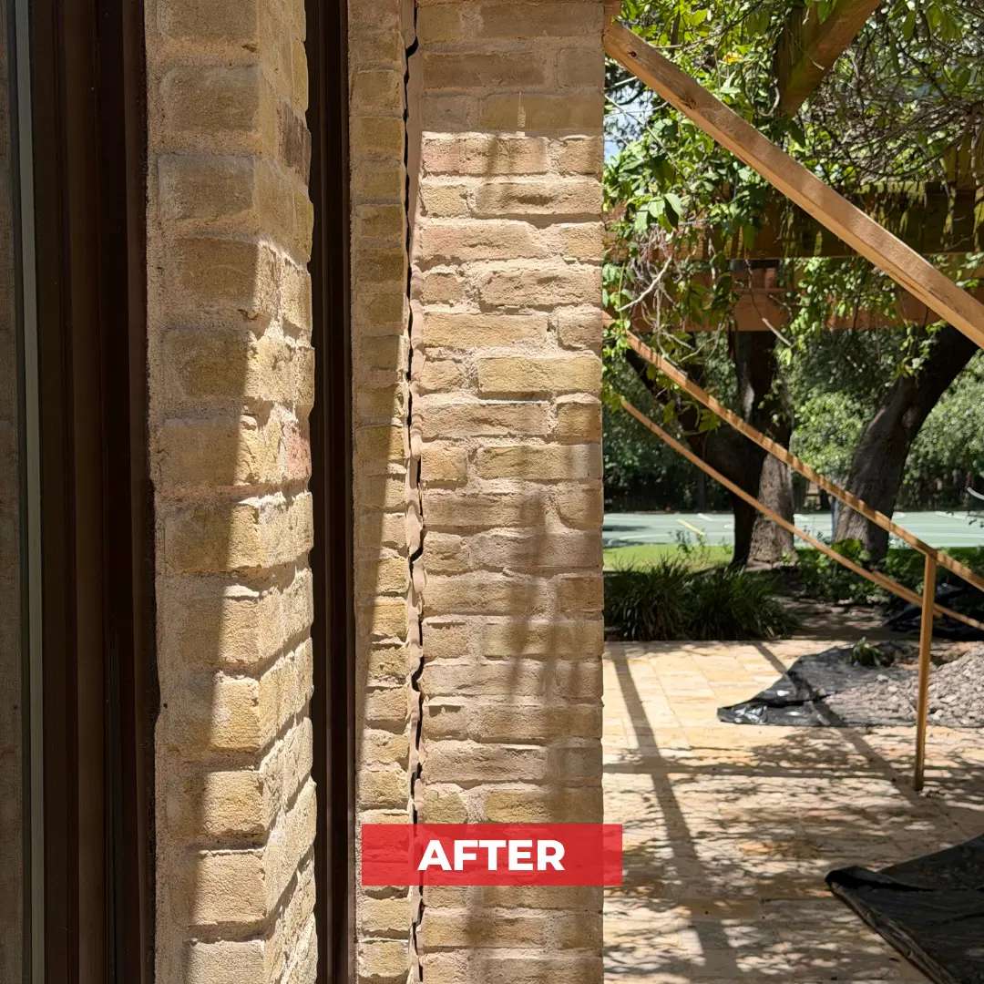 After photo showing a repaired brick support column with the crack sealed