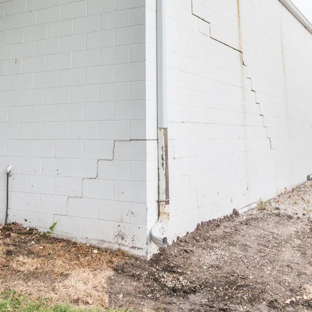 Stair step cracks along the exterior of the home