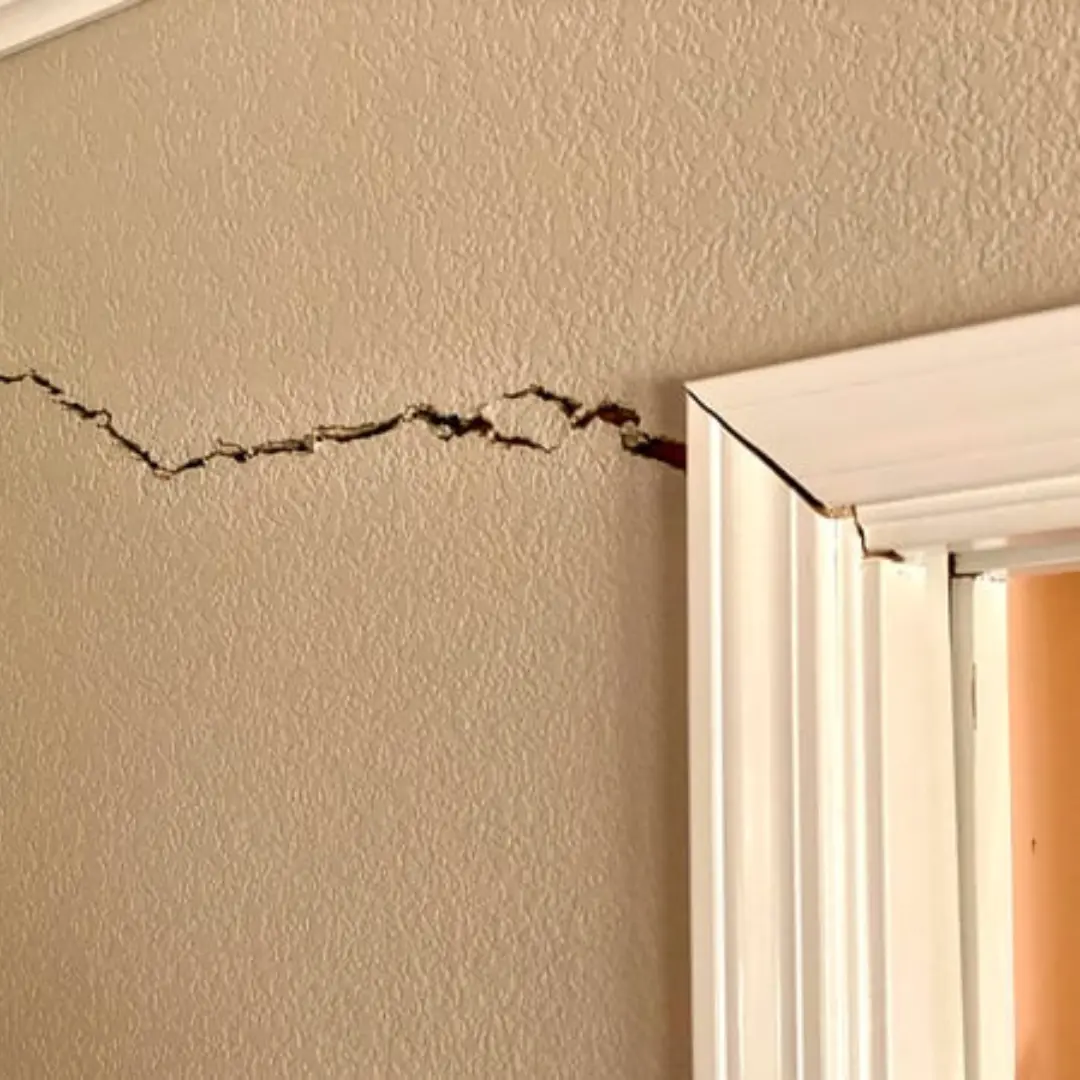Cracks along the door frame in a home