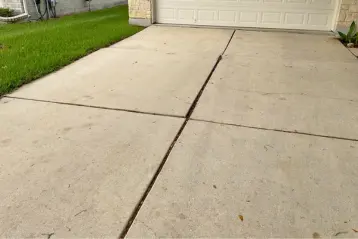 Driveway repair in Austin Texas with trip hazards